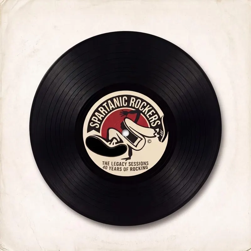 Album cover: a black vinyl record with a cream and red label showing a B-Boy in a freeze, Spartanic Rockers, The Legacy Sessions, 40 Years of Rocking